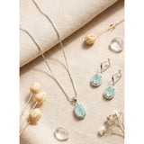 Turquoise brass silver-plated pendant set for women, accessories collection on display