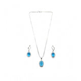 Blue brass silver-plated women's pendant set, elegant jewelry accessory on display