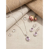 Pink brass silver-plated pendant set for women - jewelry accessory on display