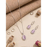 Women's pink brass silver plated pendant set on jewelry tray
