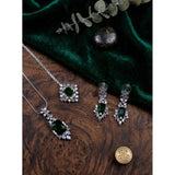 Green brass silver-plated pendant set for women, wearable jewelry accessory on display