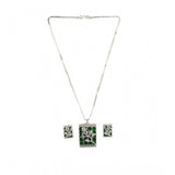 Green brass silver-plated pendant set for women, jewelry accessory on display stand
