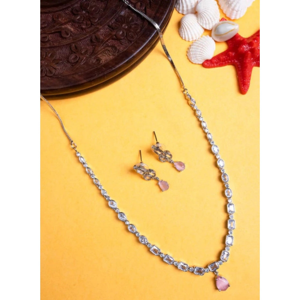 Pink brass silver plated necklace set for women, elegant jewelry on display