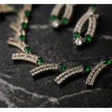Green brass silver plated necklace set for women, elegant and timeless accessories on display