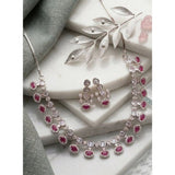 Pink brass silver-plated women's necklace set, delicate accessories on display