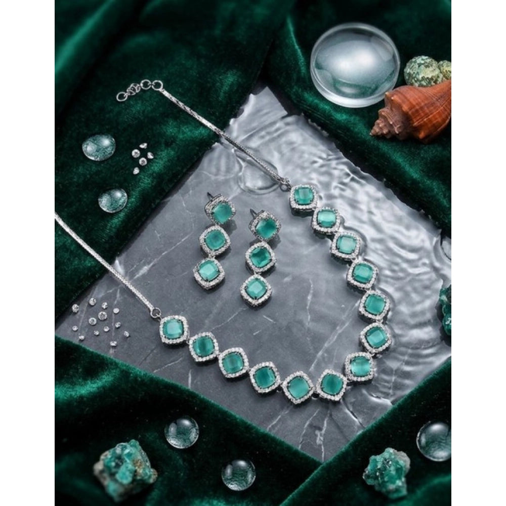 Turquoise brass silver plated necklace set for women, elegant jewelry on display