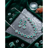 Turquoise brass silver plated necklace set for women, elegant jewelry on display