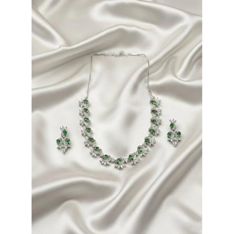 Green brass silver-plated women's necklace set on display, ideal for accessorizing formal wear