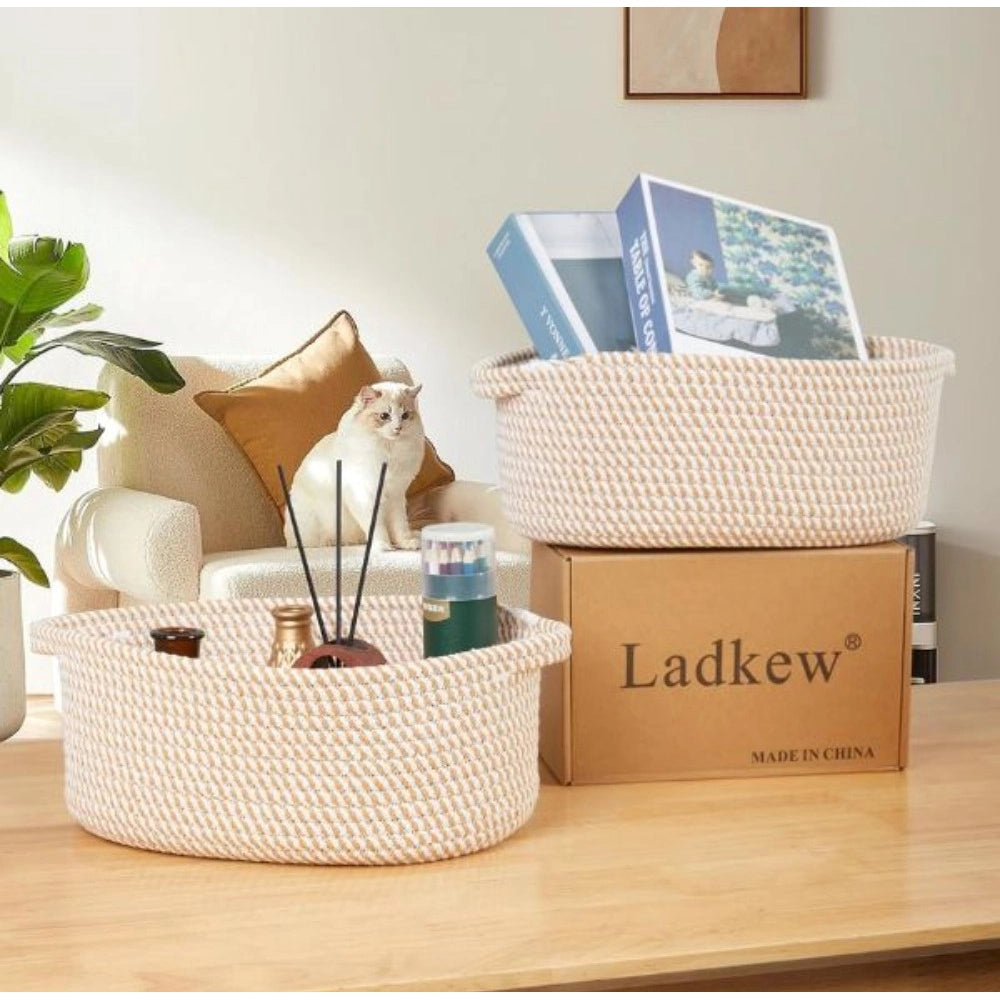 Beige cotton multi-purpose oval storage baskets (2pcs 10x7x4in), ideal for bathroom, kitchen, living room organization or kids toys