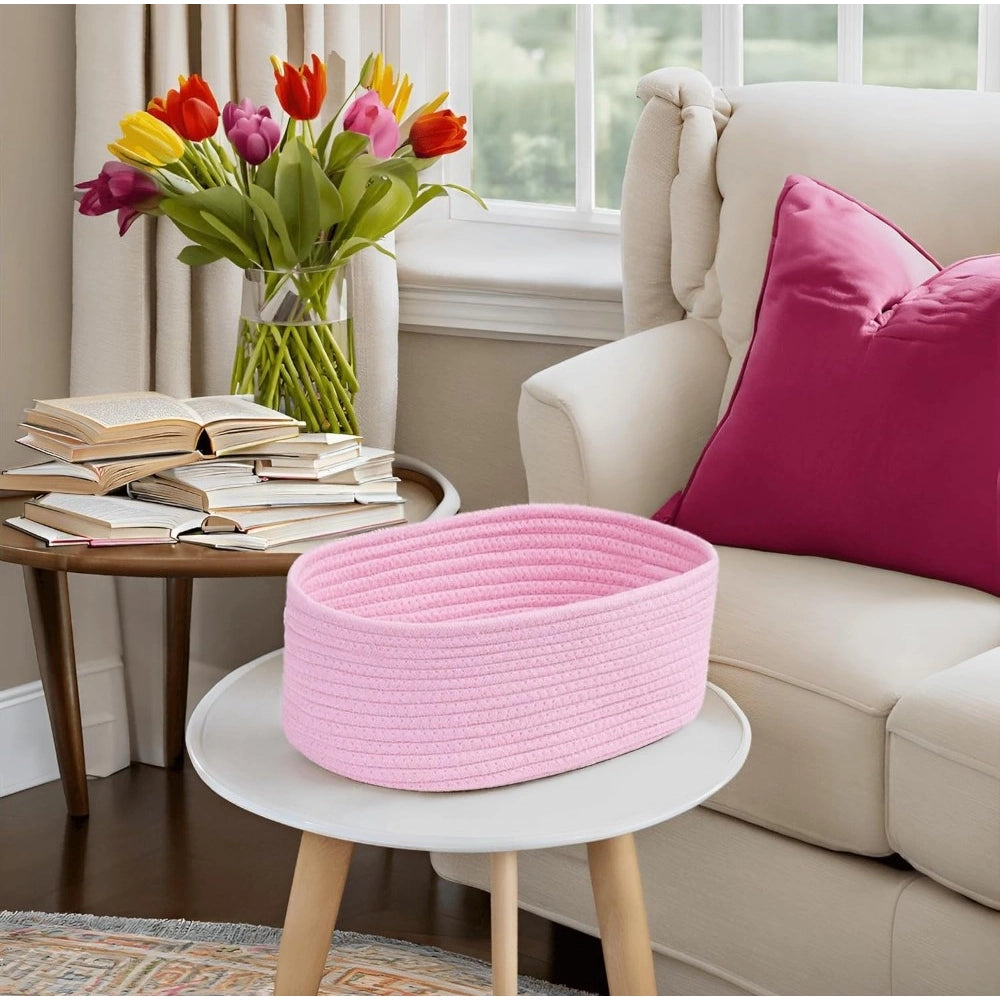 Pink cotton oval storage basket (10x7x5 inches), no lid, multi-purpose organizer for bathroom, living room, kitchen, kids toys, or clothes storage