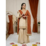 Cream & Orange silk embroidered 3/4th sleeve V-neck kurti set with sharara pant and dupatta, intricate pattern detail on traditional Indian outfit