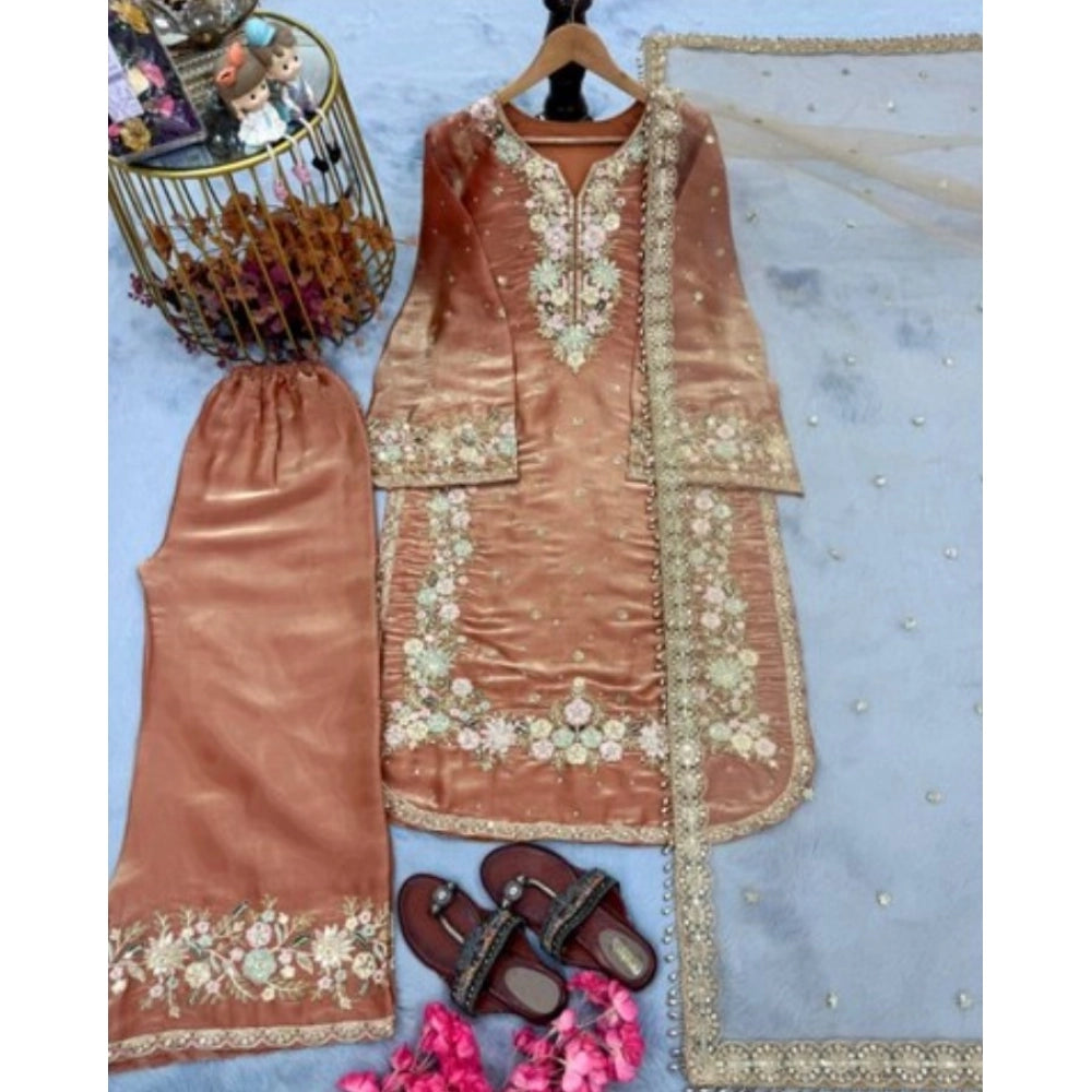 Orange silk embroidered 3/4th sleeve round kurti set with palazzo pant and dupatta, calf-length women's traditional Indian outfit on display