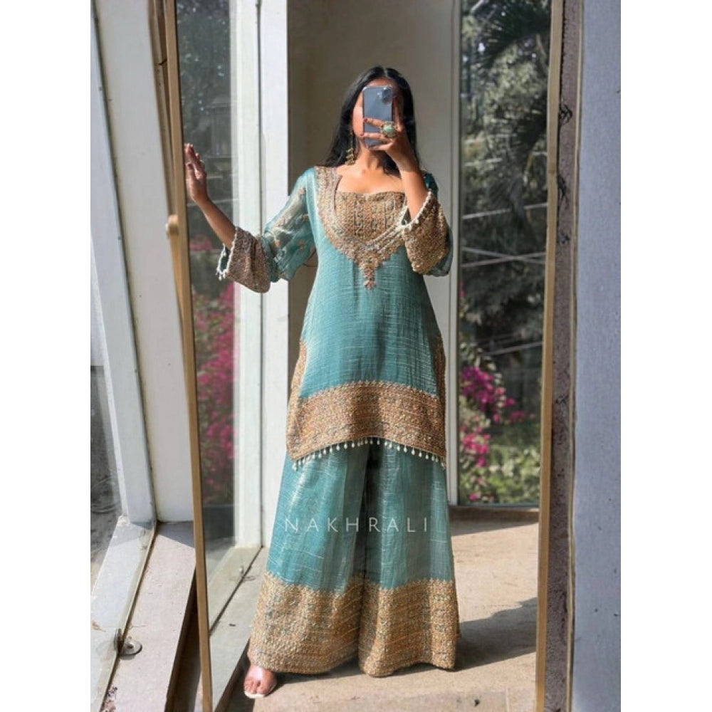 Sea Green silk embroidered 3/4th sleeve round kurti set with sharara pant and dupatta, intricate embroidery on calf-length Indian women's traditional outfit