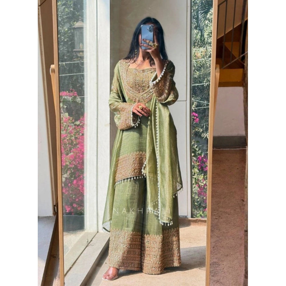 Green silk embroidered 3/4th sleeve round kurti set with sharara pant and dupatta, detailed embroidery on traditional Indian outfit