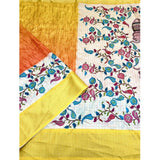 Lemon yellow cotton blend floral printed saree with unstitched blouse, vibrant blooms on flowing fabric