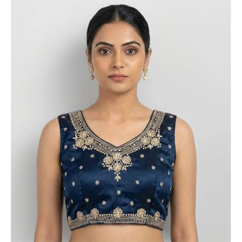 Blue silk embroidered V-neck sleeveless padded blouse with hook closure for women, close-up detail of intricate embroidery pattern