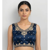 Blue silk embroidered V-neck sleeveless padded blouse with hook closure for women, close-up detail of intricate embroidery pattern