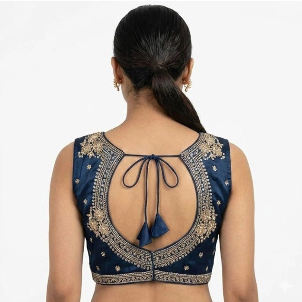Blue silk embroidered v-neck sleeveless padded blouse for women (size 38) on mannequin