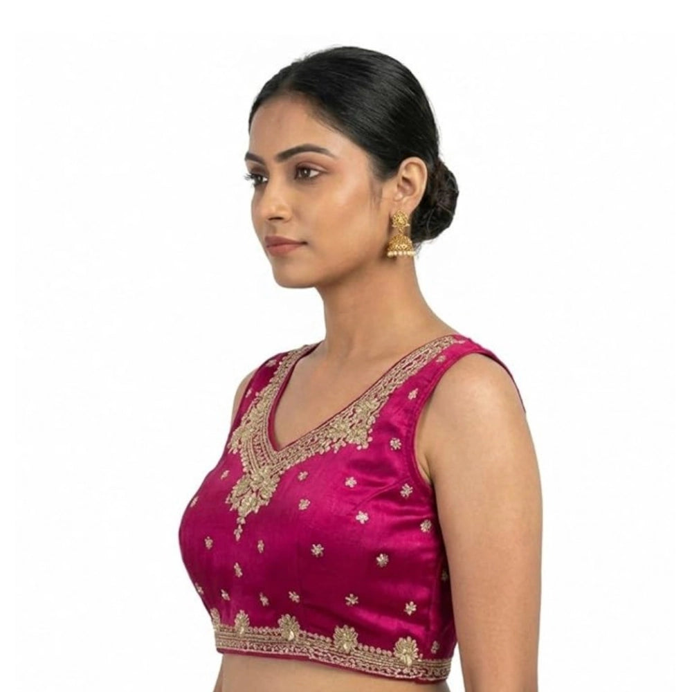 Pink silk embroidered V-neck sleeveless padded blouse with hook closure, size 38 on display stand