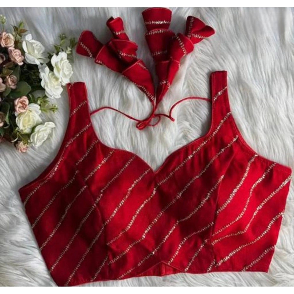 Red silk embellished sweetheart neck sleeveless blouse (size 38), hook closure, padded with intricate detailing