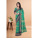 Green art silk printed saree with unstitched blouse (5.5Mtr) on model