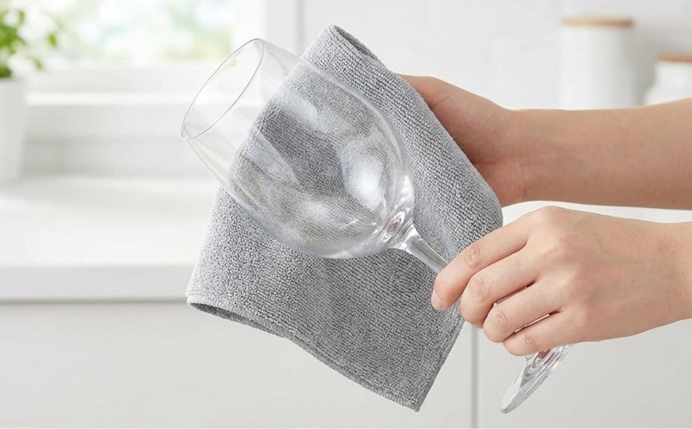 Grey microfiber cleaning cloth roll containing 20 highly absorbent reusable towels for kitchen and home use
