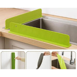 { "alt_text": "Multicolor silicone sink splash guard for kitchen counter, waterproof anti-splash protection, suction cup drain cover" }