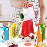 { "alt_text": "Multicolor stainless steel rotary cutter, 4 in 1 vegetable slicer kit with shredding and grating drums for kitchen prep" }