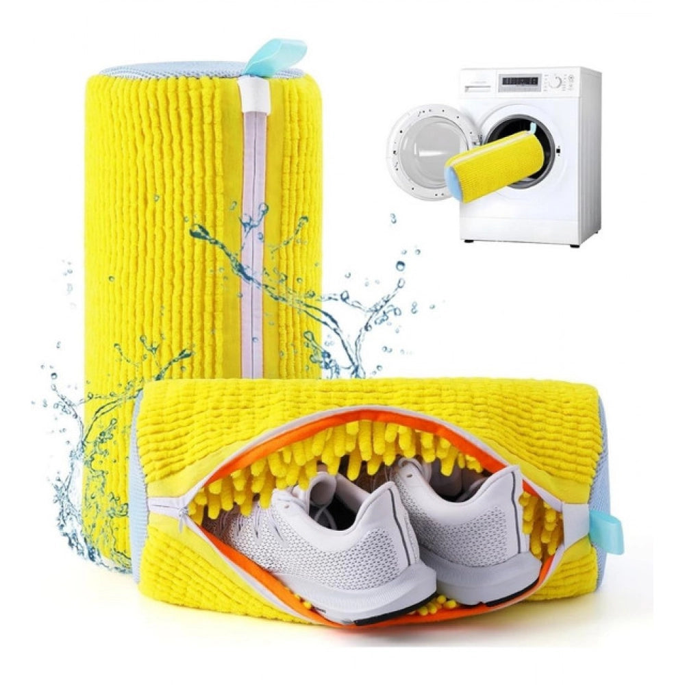 { "alt_text": "Yellow mesh shoe washing machine bags pair, deep clean laundry accessory for sneakers and athletic shoes" }