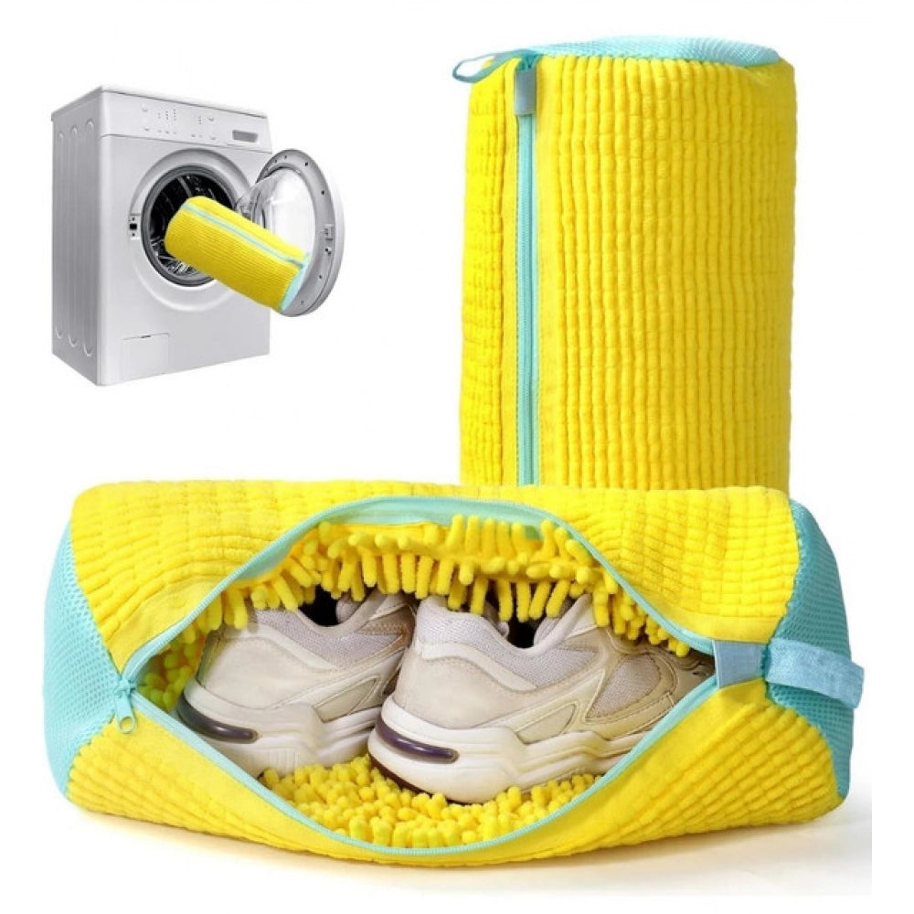 { "alt_text": "Yellow mesh shoe washing machine bags pair, deep clean laundry accessory for sneakers and athletic shoes" }