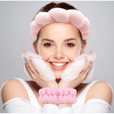 { "alt_text": "Pink elastic spa headband wristband set, absorbent beauty routine accessories for skincare and makeup" }