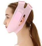Pink silicone V-line lifting face mask for slimming and jawline shaping, adjustable and reusable for men and women