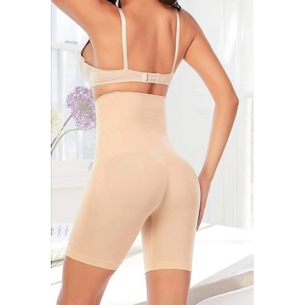 { "alt_text": "Beige stretch fabric high waist shapewear tummy tucker pack of 2, seamless compression garment for slimming silhouette" }