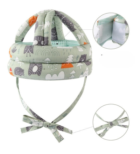 Green breathable baby safety helmet with shock-absorbing sponge and adjustable fit for toddlers