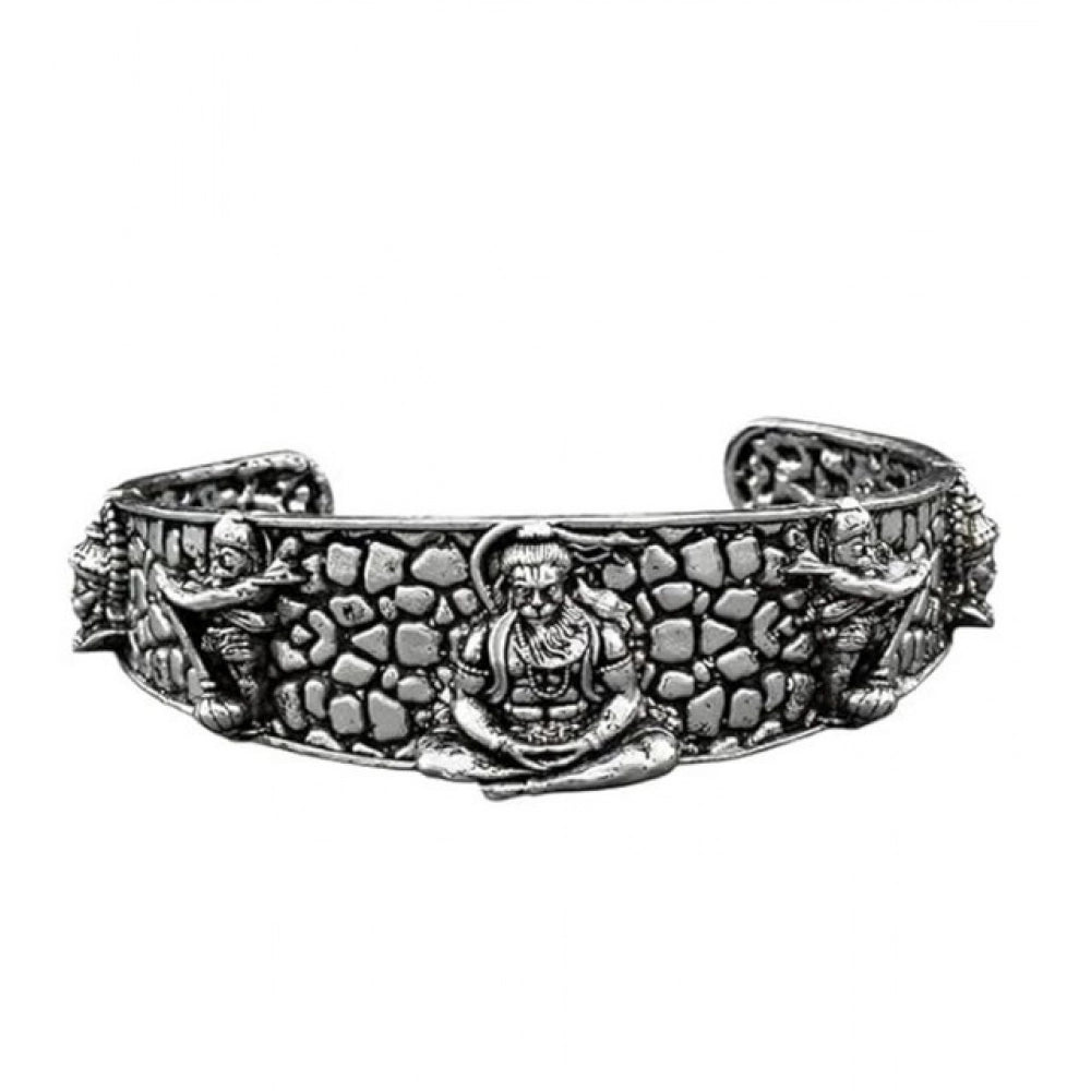 { "alt_text": "Silver metal half wrist kada for Lord Hanuman devotees, spiritual protection jewelry, inner strength accessory" }