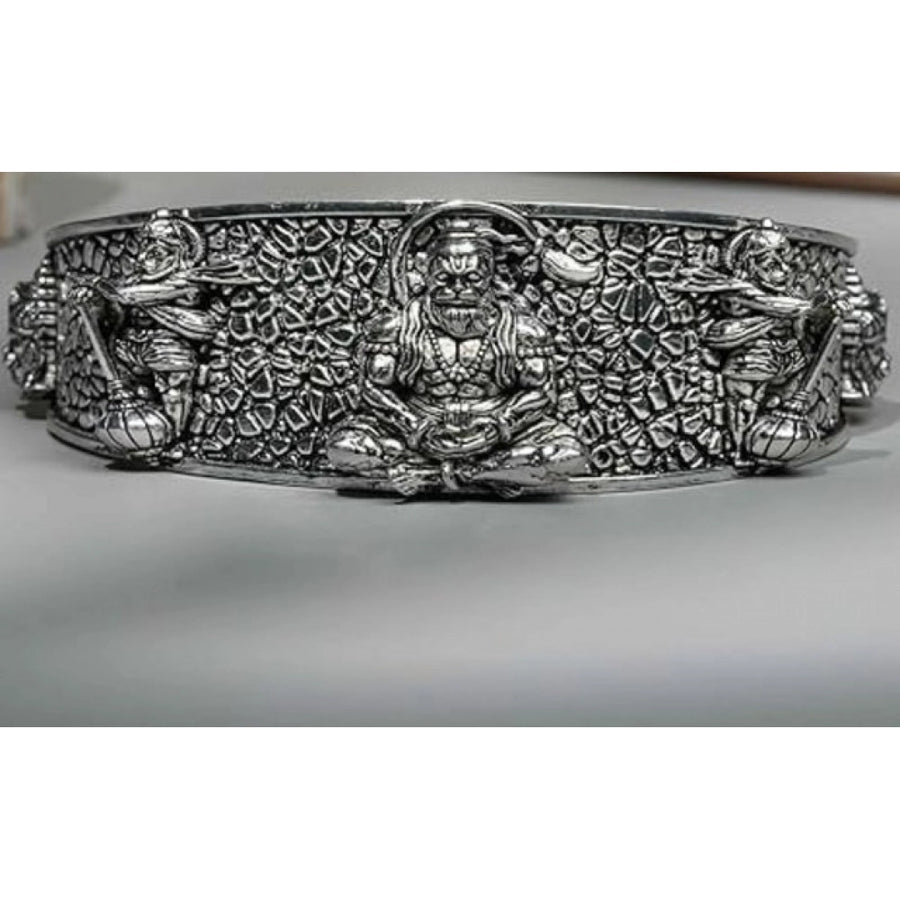 { "alt_text": "Silver metal half wrist kada for Lord Hanuman devotees, spiritual protection, and inner strength" }