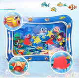 Multicolor sensory play mat for infants, featuring moving shapes and colors for motor skill development