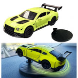 { "alt_text": "Green plastic dashboard drift car display stand, spinning platform for die-cast model cars and collectibles" }