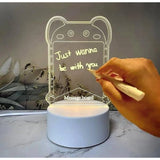 { "alt_text": "Transparent acrylic message board modern LED lamp centerpiece, soft lighting for bedroom or living room decor" }