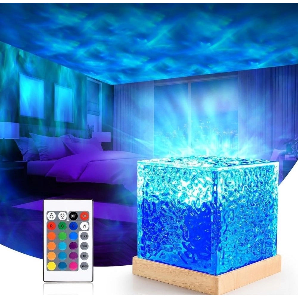 { "alt_text": "Blue acrylic lamp projecting dynamic ocean wave ripple effect, ambient mood lighting decor" }