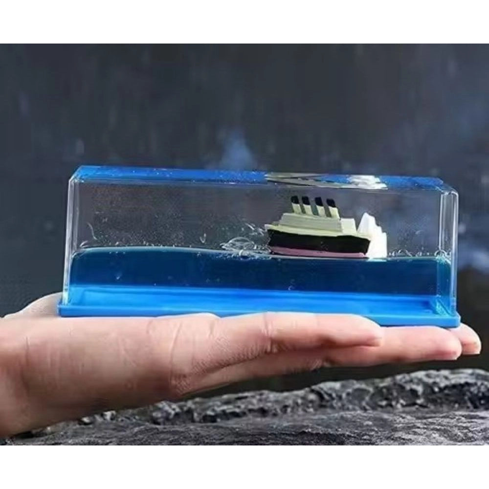 { "alt_text": "Blue PVC decorative liquid wave cruise ship ornament, perfect desk paperweight for home office decor" }