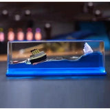 { "alt_text": "Blue PVC decorative liquid wave cruise ship ornament, perfect desk paperweight for home office decor" }