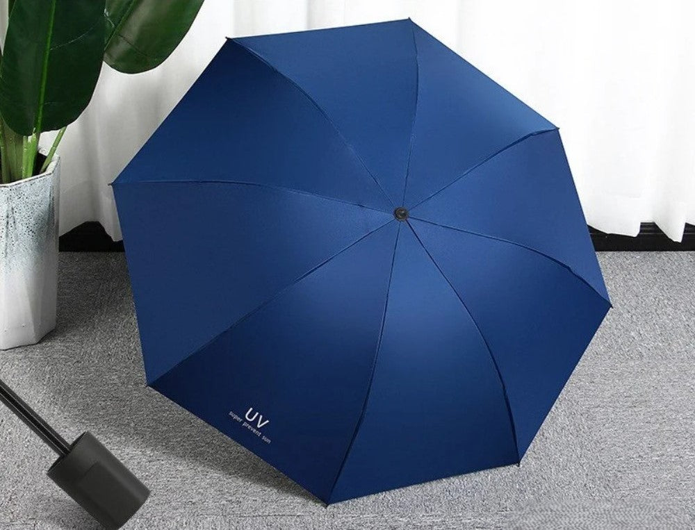 Blue mini UV umbrella with Teflon coating and fiberglass ribs for wind resistance and sun protection