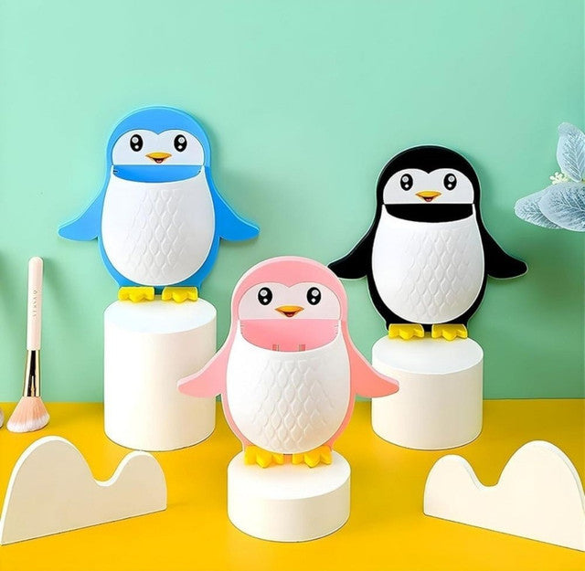 Multicolor wall mounted penguin toothpaste holder for organizing toothbrushes and bathroom essentials