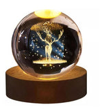 Multicolor crystal night lamp with glass celestial ball and wooden base, powered by USB