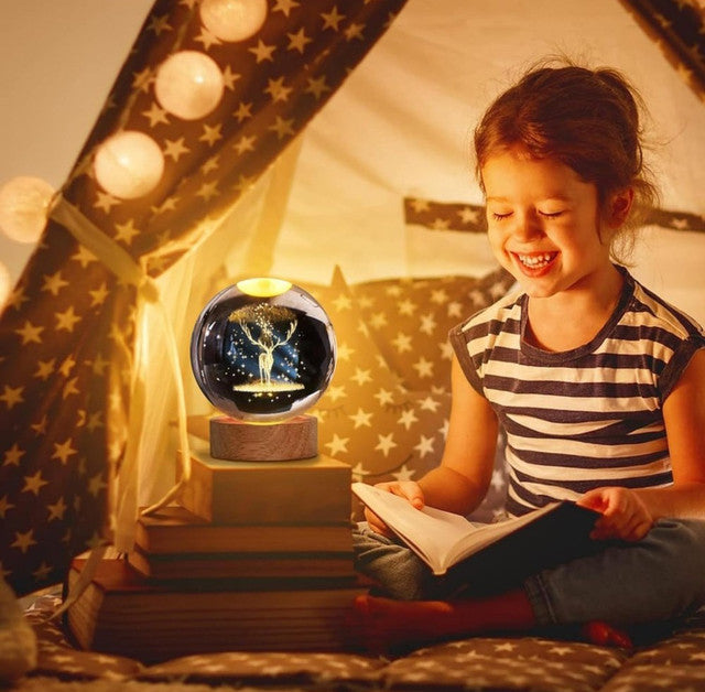 Multicolor crystal night lamp with glass celestial ball and wooden base, powered by USB