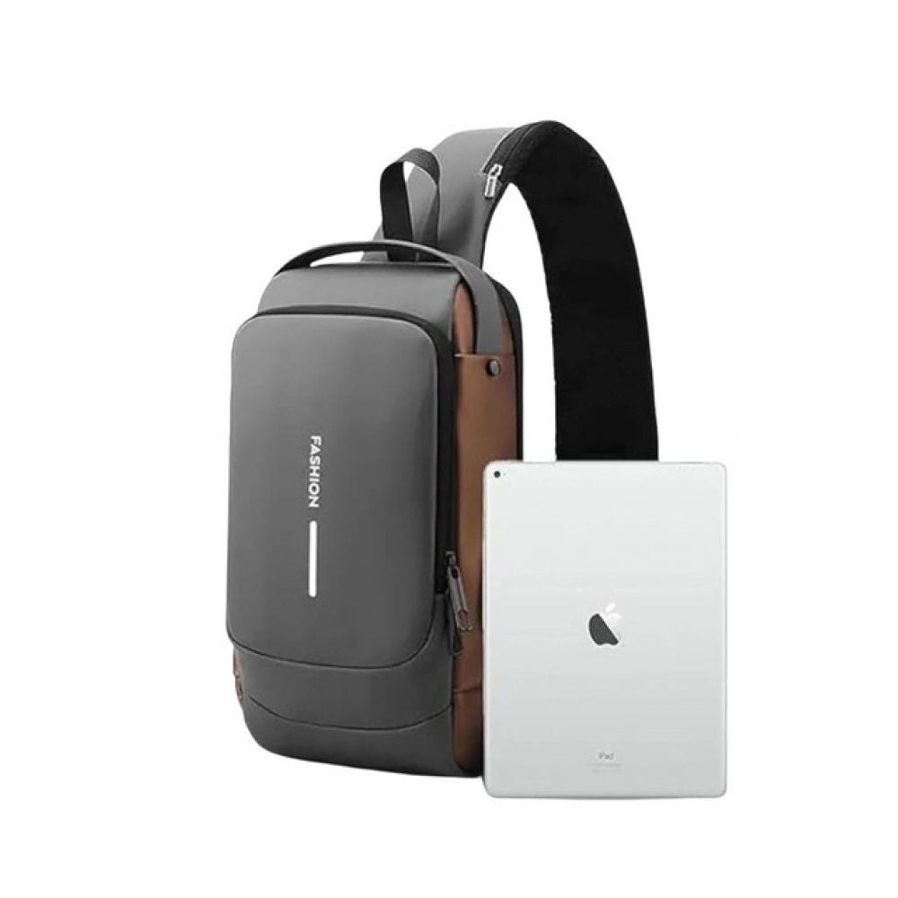 Waterproof black sling backpack with adjustable strap, USB charging port, and multiple pockets for office/outdoor use