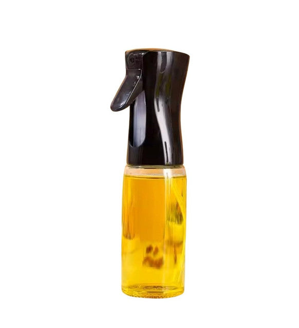 Black glass oil sprayer for cooking, featuring a transparent body and precision nozzle for even oil control