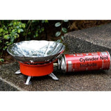 Orange windproof lotus stove for camping & trekking; compact, foldable, easy-to-carry mini gas burner with dedicated carrying bag