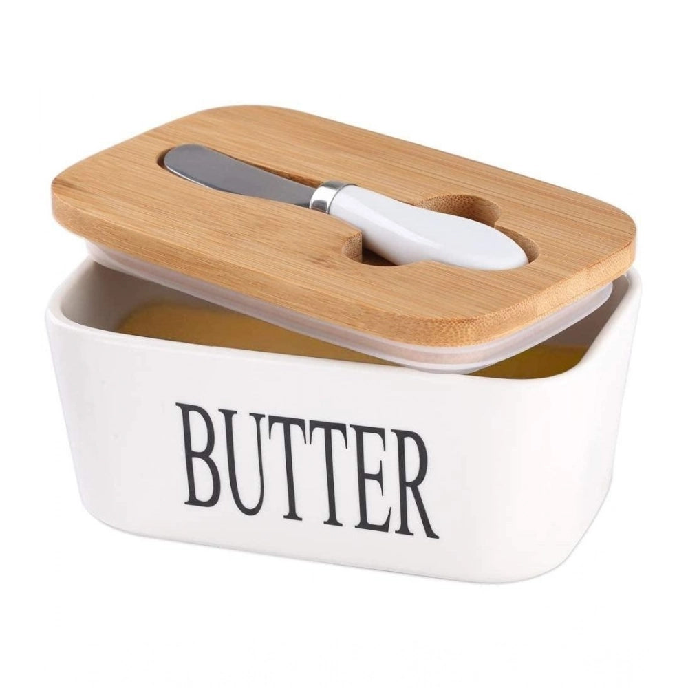{ "alt_text": "White ceramic butter box with bamboo lid, airtight storage container for fresh butter, kitchen countertop accessory" }